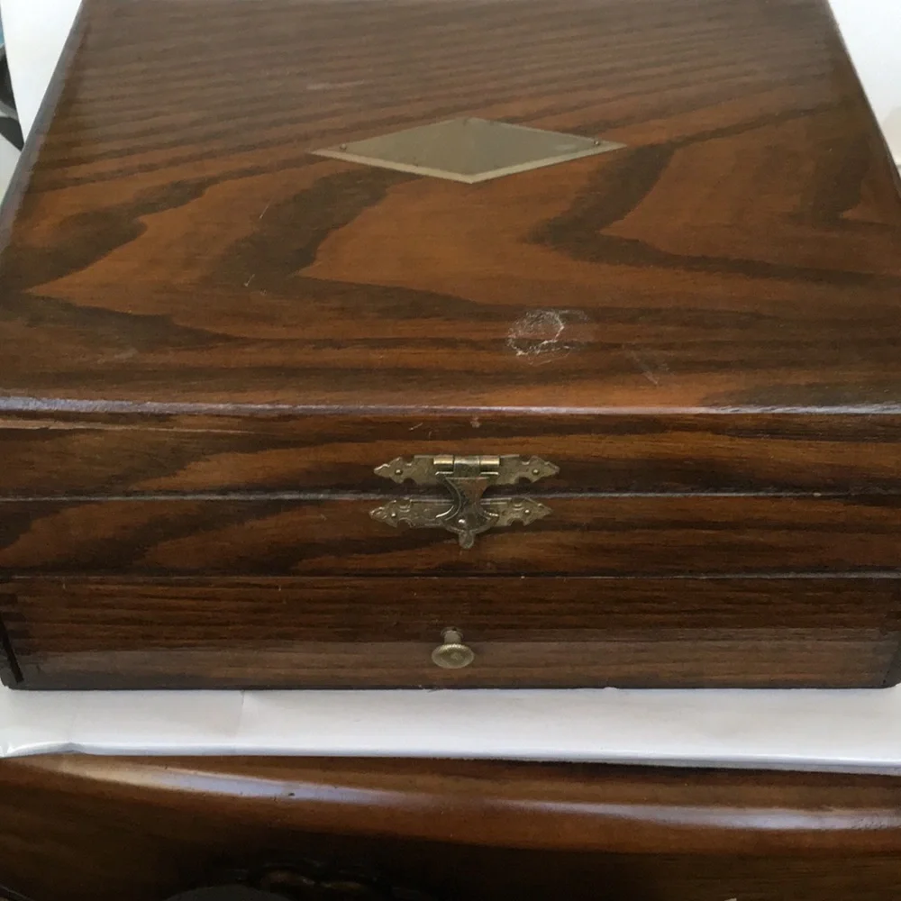 Vintage silverware set in original wooden chest with certificate of authenticity